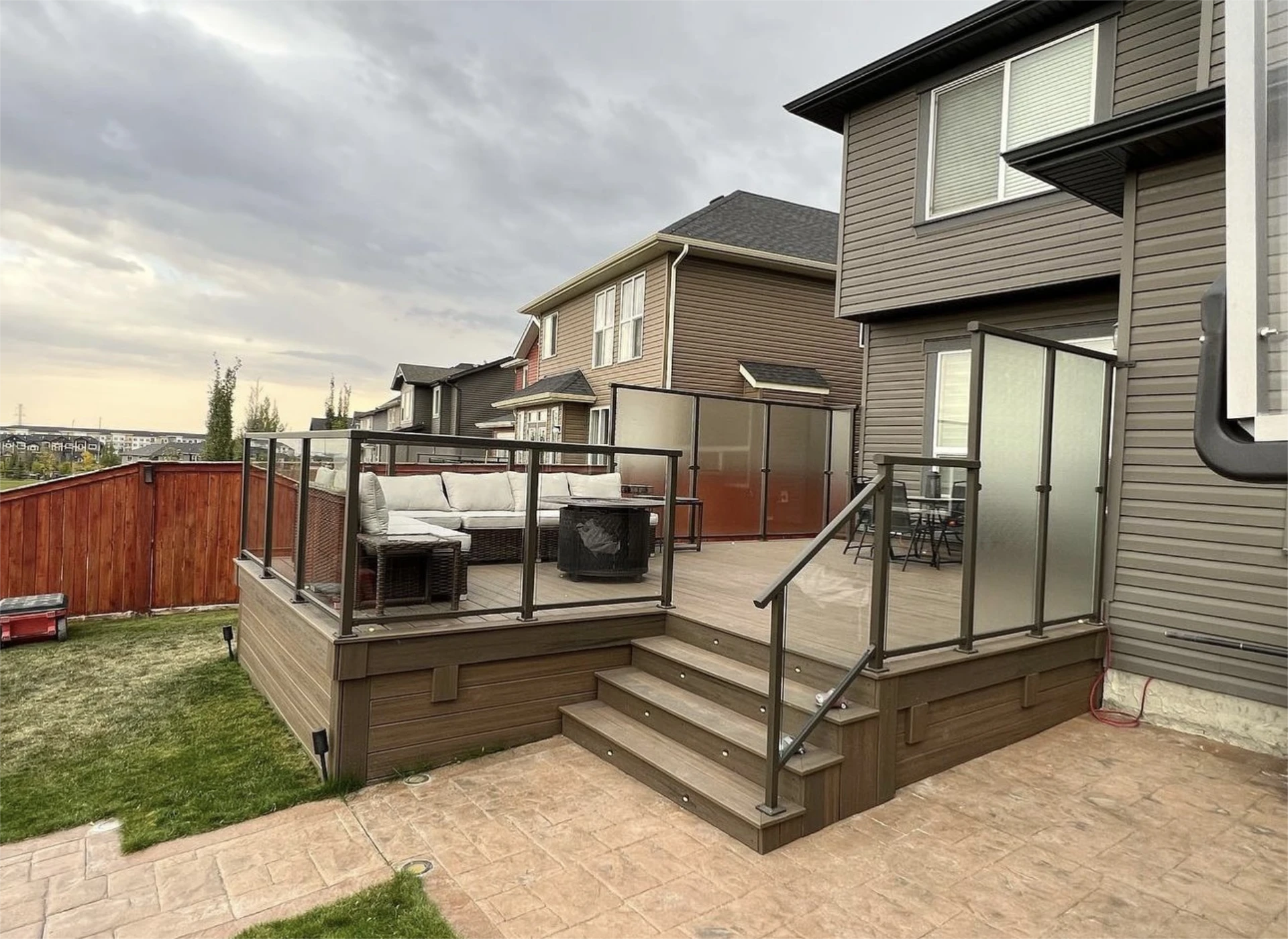 Backyard deck with frosted privacy panels