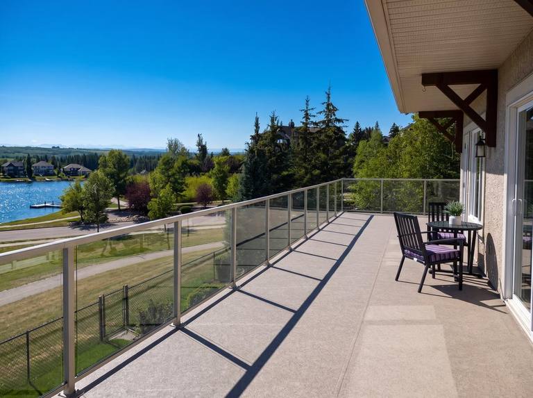 Speckled grey vinyl membrane deck at a lakefront home in Calgary